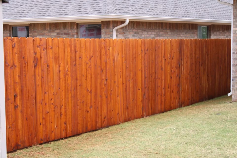Should I Hire a Pro to Stain My Fence?