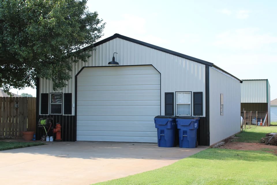 A metal shop building in Oklahoma City that has just been painted with Sherwin Williams Bondplex paint.