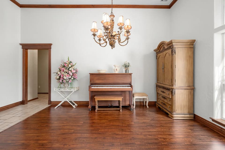 Freshly painted interior with wood floors and detailed trim