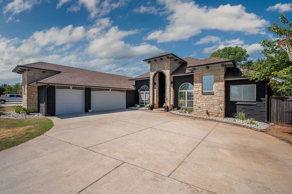 After: the garage wing with Celtic Stone painted brick and clean white doors
